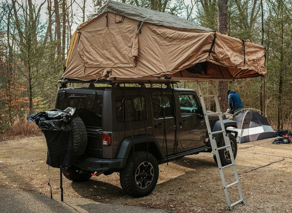 Choosing Your Off-Road Oasis: Camper Shells vs. Rooftop Tents